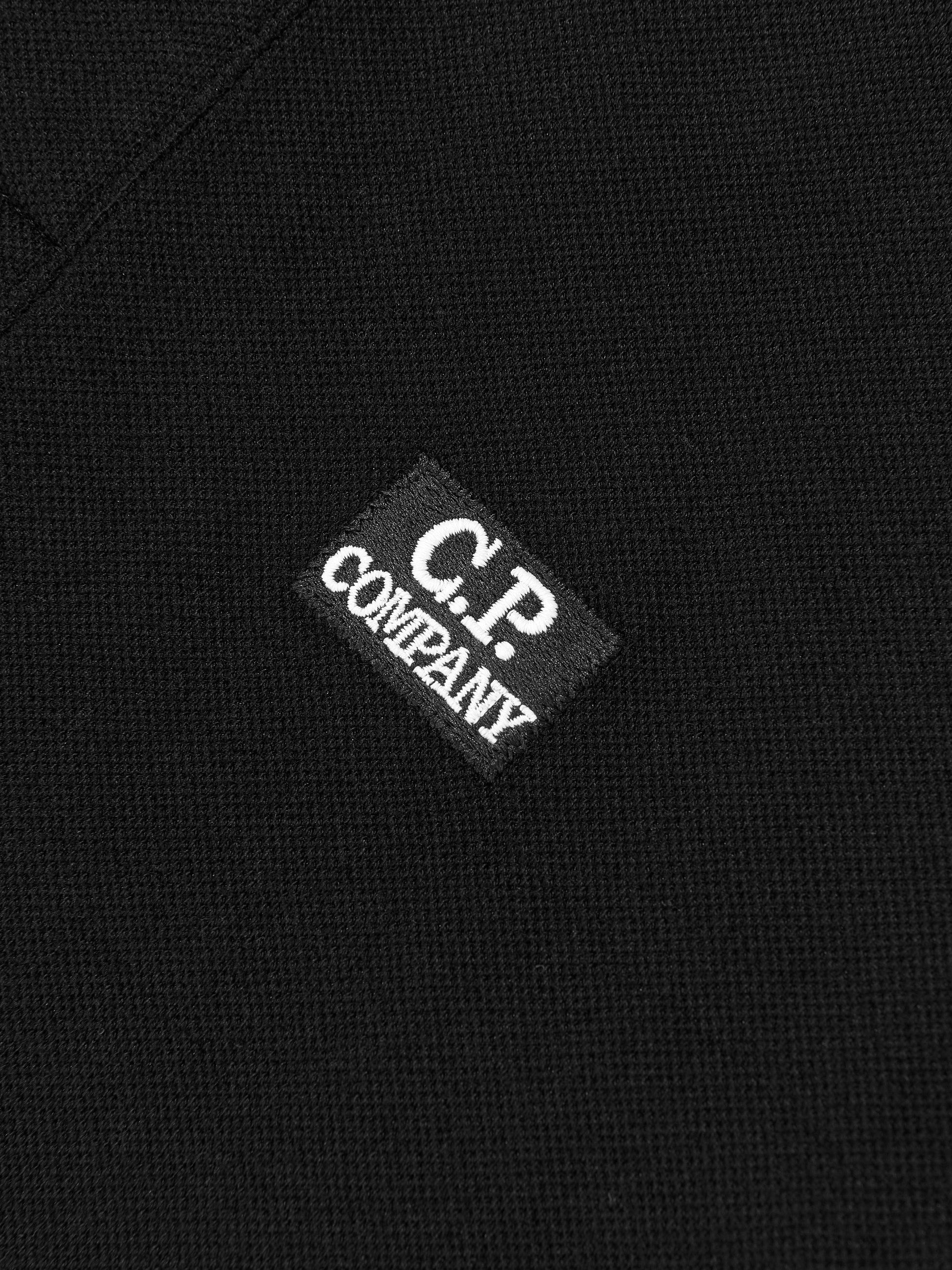 C.P. Company Boys Logo Polo Shirt in Black Childsplay Clothing