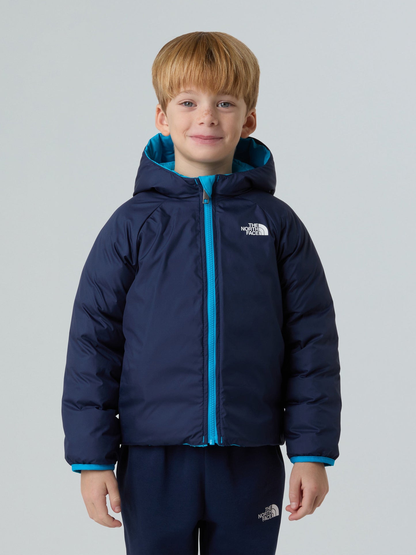The North Face Kids Reversible Perrito Hooded Jacket in Blue Childsplay Clothing