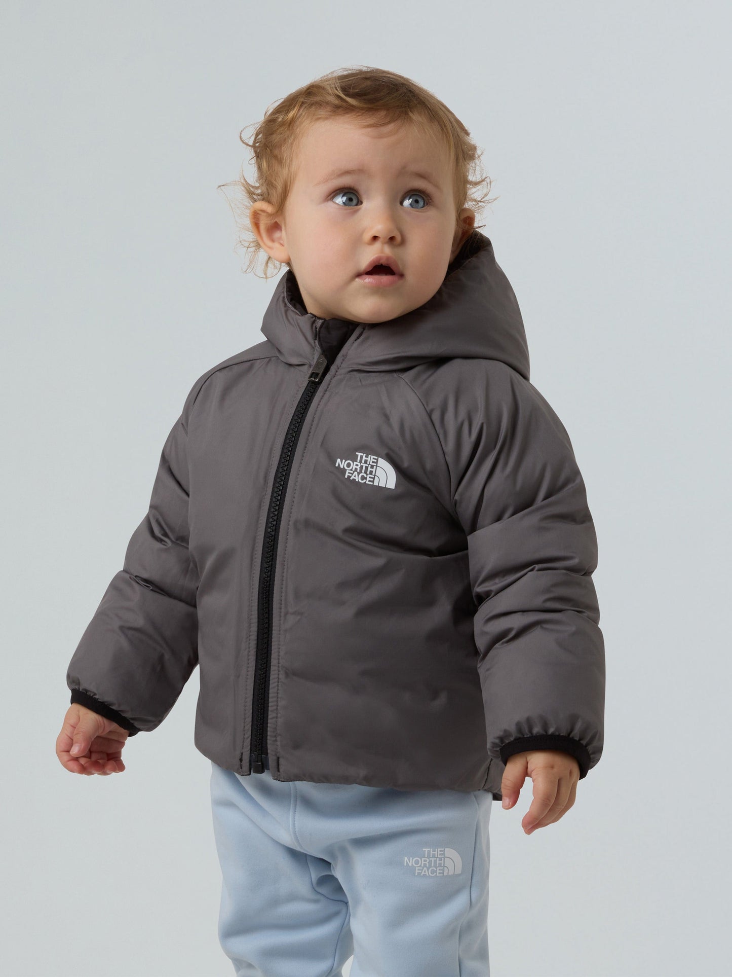 The North Face Baby Reversible Perrito Hooded Jacket in Black Childsplay Clothing